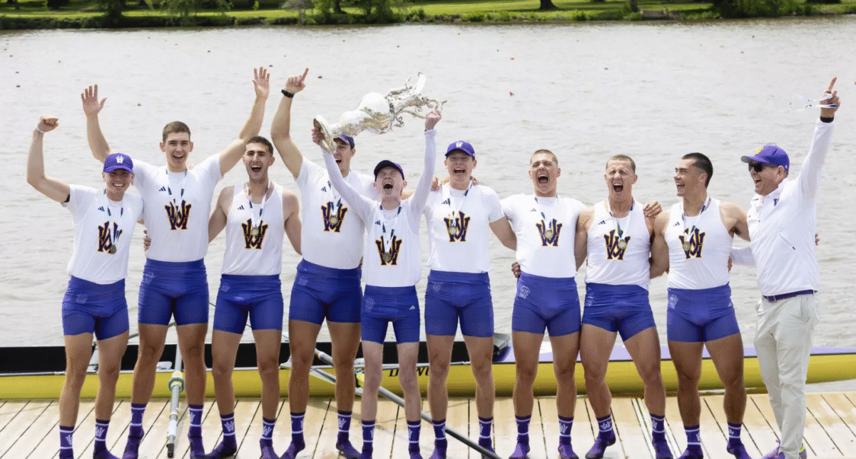Team of rowers cheering